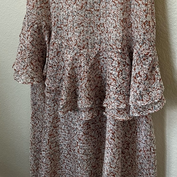 FLORET STUDIOS | Cold Shoulder Asymmetric Ruffle Dress In Rust-Cream | Size XS - Picture 7 of 10